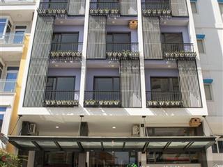 Bán toà nhà 30 phòng chdv, nở hậu đẹp  thu nhập 180tr/tháng  nơ trang long, bình thạnh