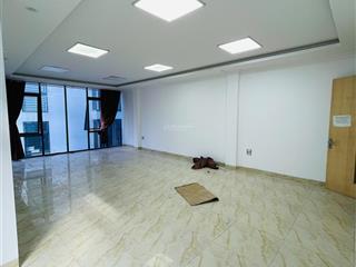 Cho thuê căn nhà lô góc mặt phố nguyễn khang 75m2 x 7 tầng thang máy, ôtô đỗ cửa
