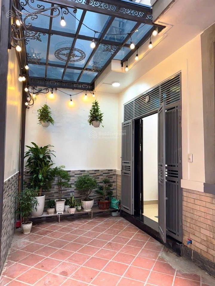 Tam trinh  hơn 7 tỷ  oto thông 2 đầu, nhà gần mặt phố  35m x 6 tầng.