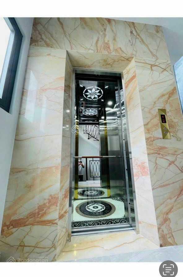 Bán nhà 2 mặt tiền hxh thích quảng đức  nhà mới xây 4 tầng + thang máy  4 x 14m  10 tỷ tl