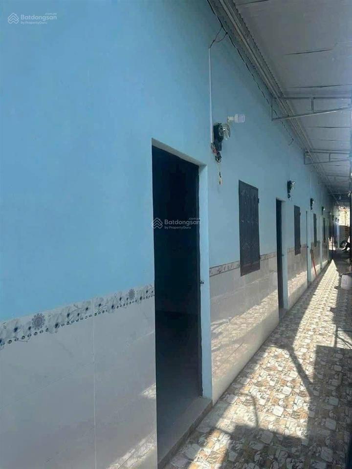 Chủ ngộp bán nhà kèm 8 phòng trọ đang cho thuê full (154m2) kế bên chợ hưng long shr giá 820triệu