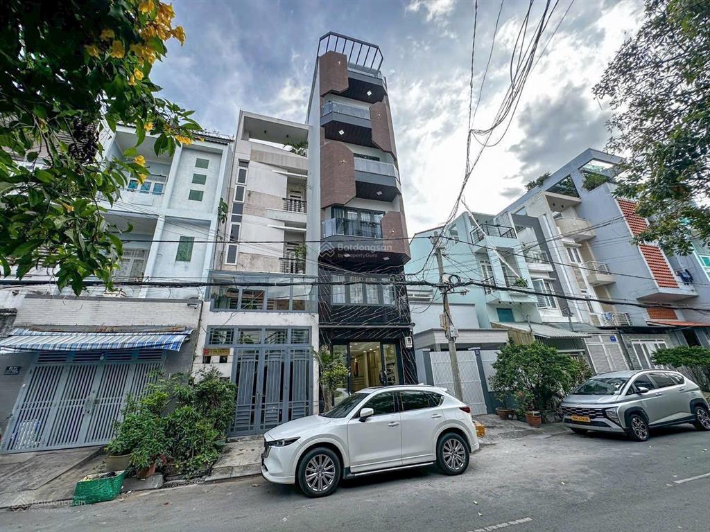 Bán nhà riêng hẻm 8m 5dài 15m 4 tầng trung tâm quận 7, 10ty nhỉnh