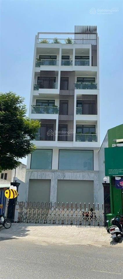Bán gấp tòa nhà vp(9m x 30m)úc 7 lầu. có thang máy mặt tiền đường trần thị cờ, phường thới an, q12