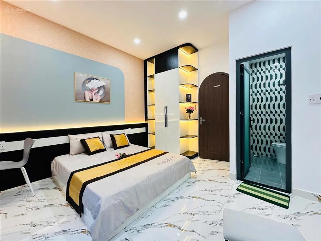 Sang úc định cư! bán nhà 57m2 đường trần não,q2 giá 3tỷ250. gần cầu sài gòn. hẻm 8m. sẵn sổ