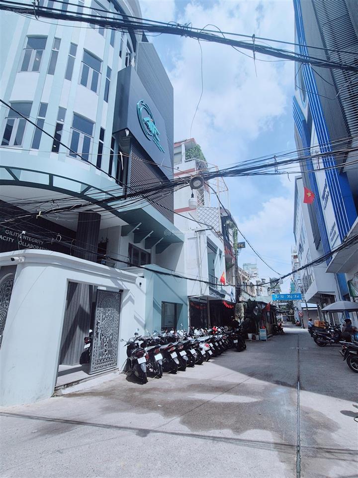 Bán nhà 6x12m  4 lầu bàn cờ  đang thuê 45 triệu  giá 19.5 tỷ  0906 366 ***