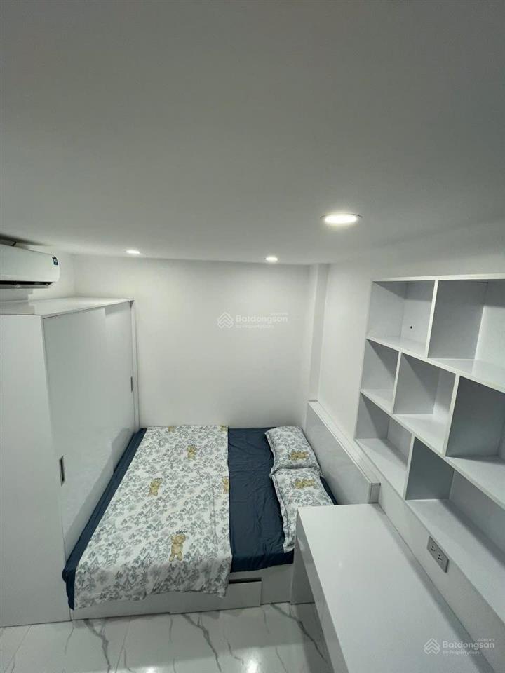 Tòa chdv xuân thủy, 77m2*7t, mt 12m,sát đh quốc gia, 25 phòng kk, đủ gpxd/pccc, dòng tiền 7%/năm