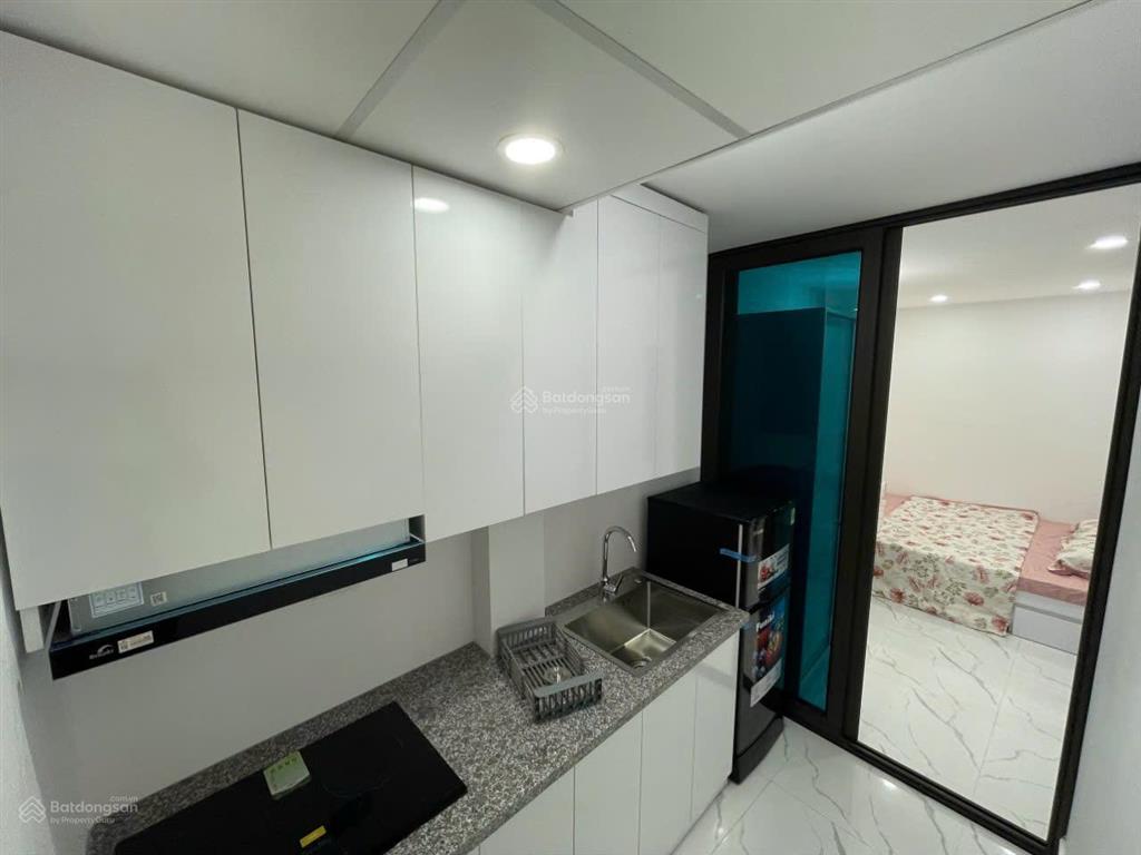 Tòa chdv xuân thủy, 77m2*7t, mt 12m,sát đh quốc gia, 25 phòng kk, đủ gpxd/pccc, dòng tiền 7%/năm