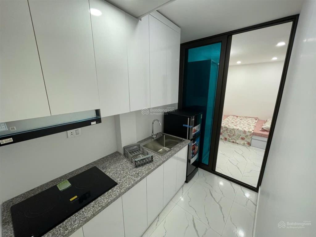 Tòa chdv xuân thủy, 77m2*7t, mt 12m,sát đh quốc gia, 25 phòng kk, đủ gpxd/pccc, dòng tiền 7%/năm