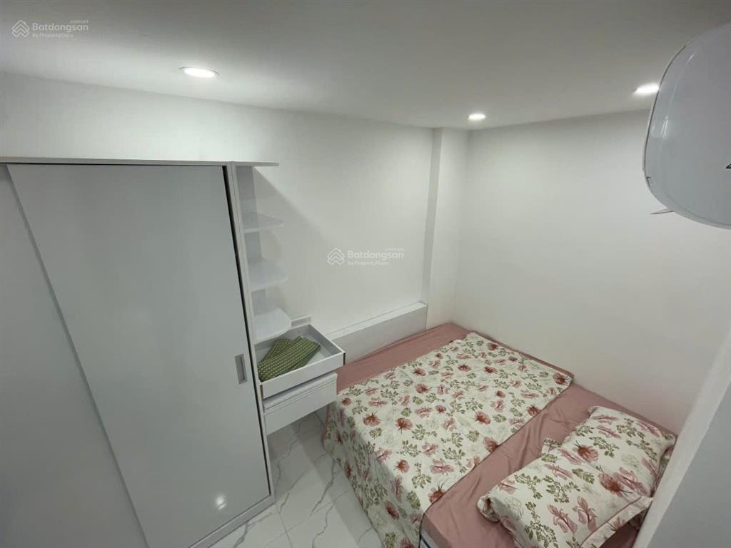 Tòa chdv xuân thủy, 77m2*7t, mt 12m,sát đh quốc gia, 25 phòng kk, đủ gpxd/pccc, dòng tiền 7%/năm