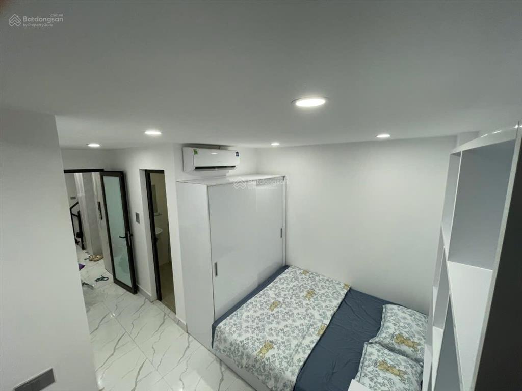 Tòa chdv xuân thủy, 77m2*7t, mt 12m,sát đh quốc gia, 25 phòng kk, đủ gpxd/pccc, dòng tiền 7%/năm