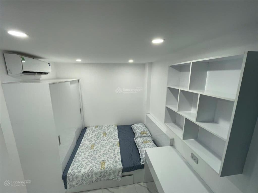 Tòa chdv xuân thủy, 77m2*7t, mt 12m,sát đh quốc gia, 25 phòng kk, đủ gpxd/pccc, dòng tiền 7%/năm