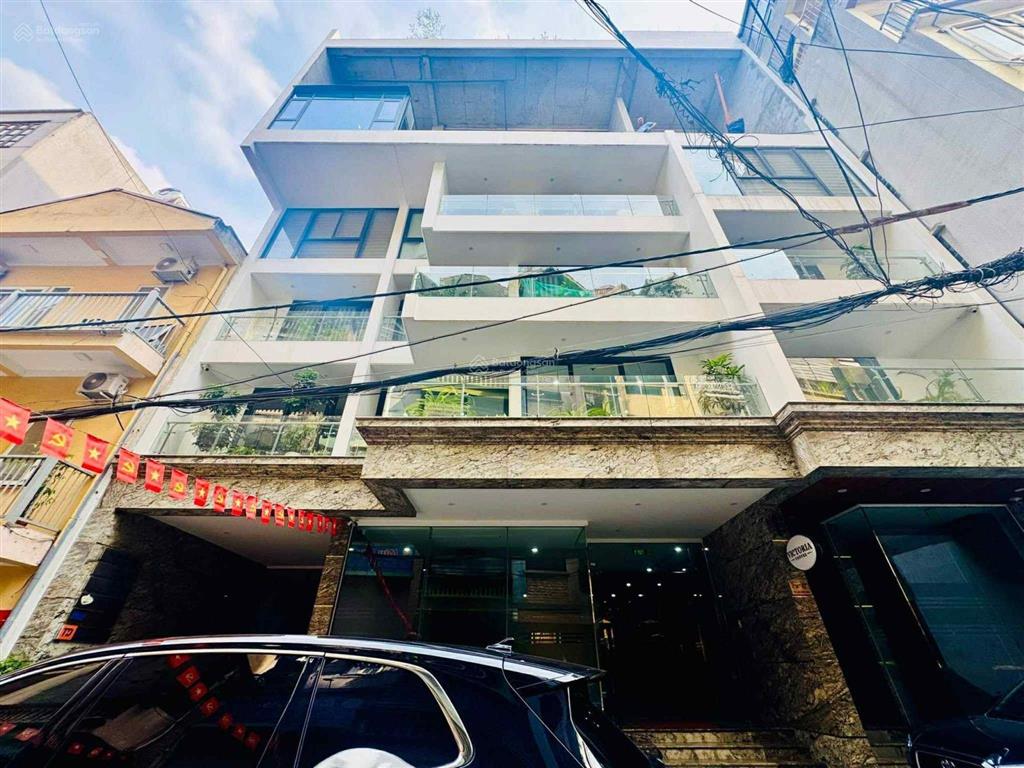 Bán nhà phố lạc long quân 288m tòa văn phòng 8 tầng có hầm 2 thoáng. bán 125 tỷ.  0936 391 ***