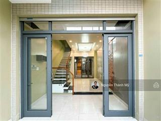 Nhà 4 tầng vip  mặt tiền sầm uất  ngay cầu tham lương