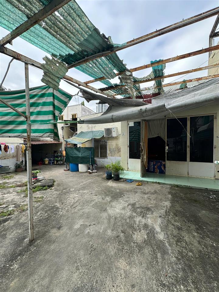 Bán đất kèm nhà diện tích 318m2 kèm nhà và 6 phòng trọ. đường tân thuận tây quận 7. giá 20,765 tỷ