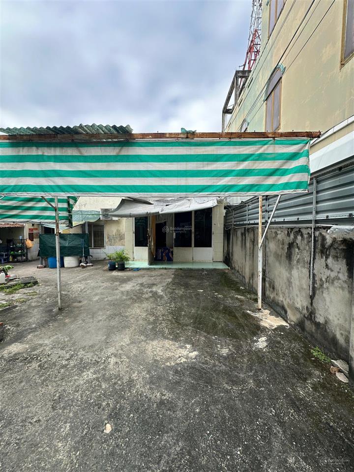 Bán đất kèm nhà diện tích 318m2 kèm nhà và 6 phòng trọ. đường tân thuận tây quận 7. giá 20,765 tỷ