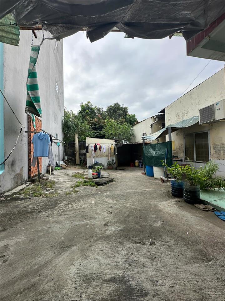 Bán đất kèm nhà diện tích 318m2 kèm nhà và 6 phòng trọ. đường tân thuận tây quận 7. giá 20,765 tỷ