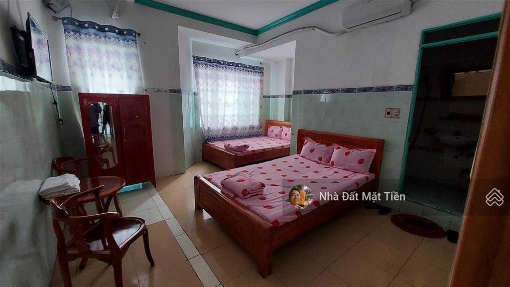 Khách sạn dt 640m2 sàn (22p) mặt tiền ql22, gần ngã 4 trung chánh, có pccc, ko bị lg ql22