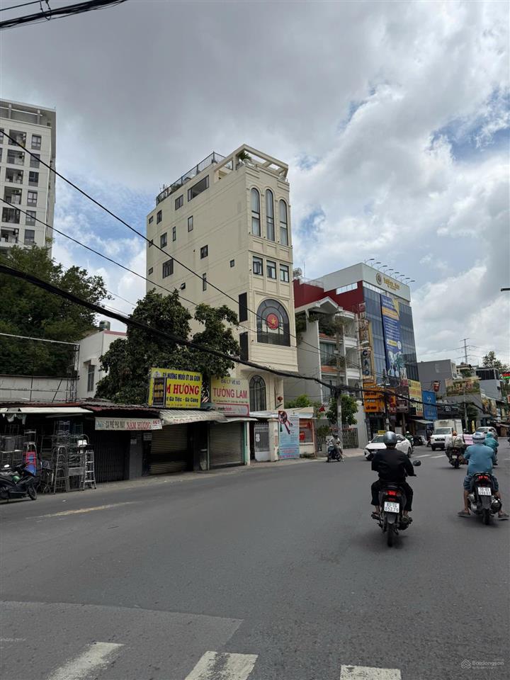 Lời ngay 70 tỷ, bán gấp nhà mặt tiền lê quang định  20x50m  xd hầm 7 tầng  giá 98 tỷ