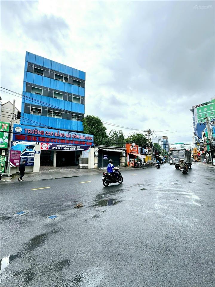 Lời ngay 70 tỷ, bán gấp nhà mặt tiền lê quang định  20x50m  xd hầm 7 tầng  giá 98 tỷ