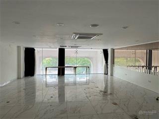Bán tòa văn phòng 10 tầng thang máy, mặt phố trần vỹ, vỉa hè rộng, 120m2 giá 89 tỷ