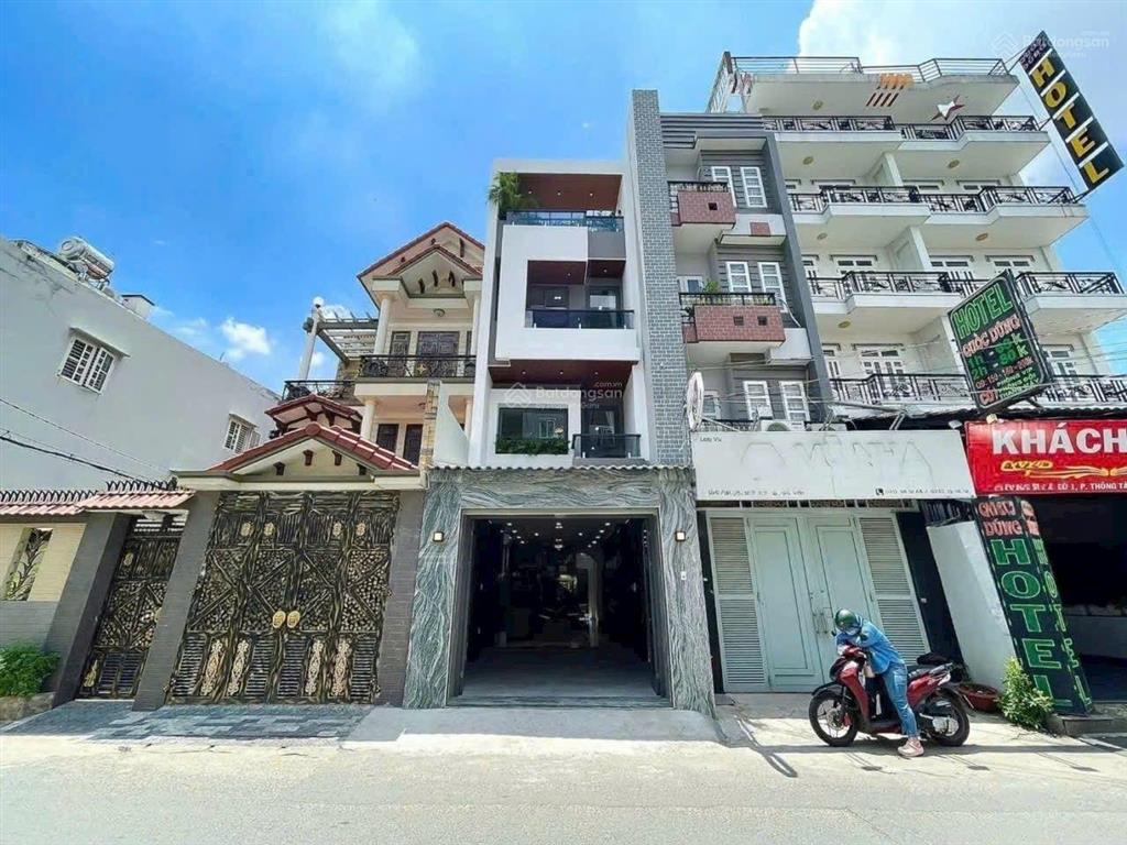 Bán nhà mới mặt tiền đường số 1 phường 11 gò vấp, dt 4m x 21,5m (86m2), 4 tầng, thang máy chỉ 15,3t