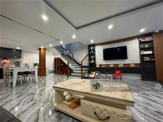 Nhà đẹp  giá tốt ở ngay đường 8m lê quang định (4.5x20m)  4 tầng cứng cáp, xe hơi đỗ trong nhà.