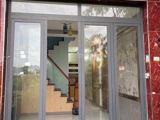 Nhà mới 1 trệt 1 lầu + 750tr + gần chợ hưng long