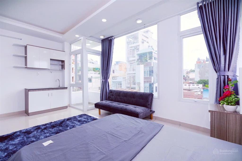 Bán chdv 5 tầng + hầm (5,5x12m) phan văn trị  hđ thuê 45tr/th 10,4 tỷ
