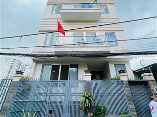 Nhà 5 tầng, 15 phòng cho thuê full, có 2 hầm để xe, sát vách siêu thị gigamall phạm văn đồng.