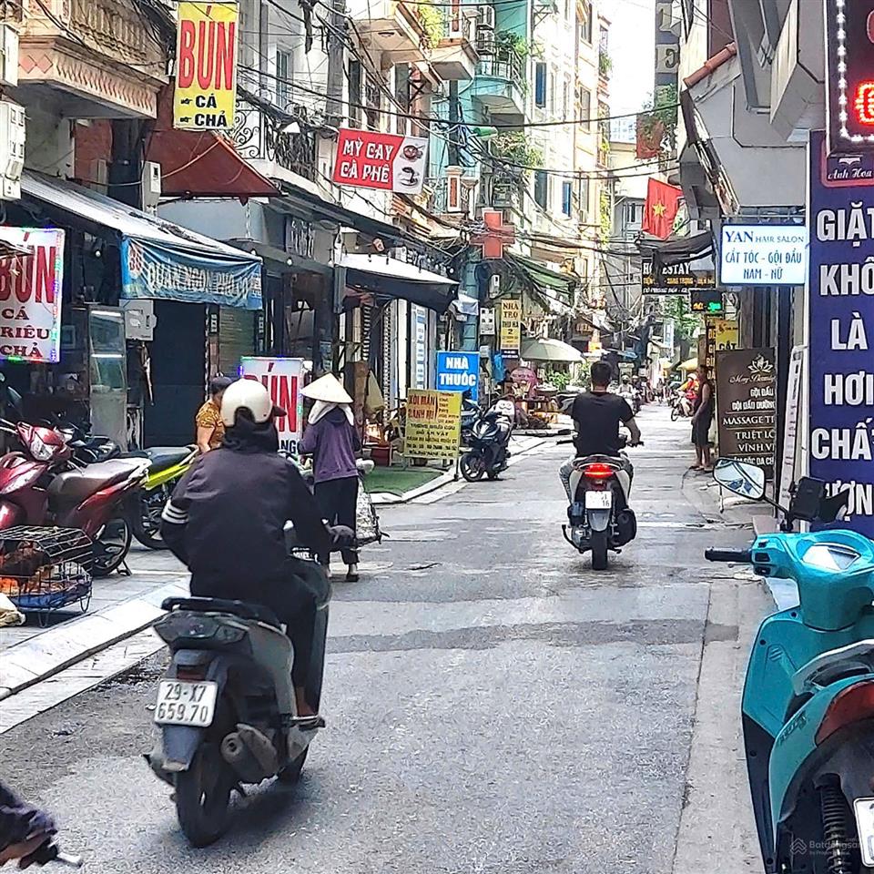 Nhà doãn kế thiện lô góc 2 mặt ngõ 65m2 7 tầng thang máy vỉa hè kd ngày đêm