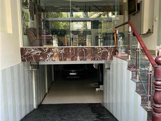 Cho thuê nhà mặt tiền đường phạm hùng ngay gần p4 quận 8. 5x20m.hầm 3 tầng. thang máy. 22tr/tháng
