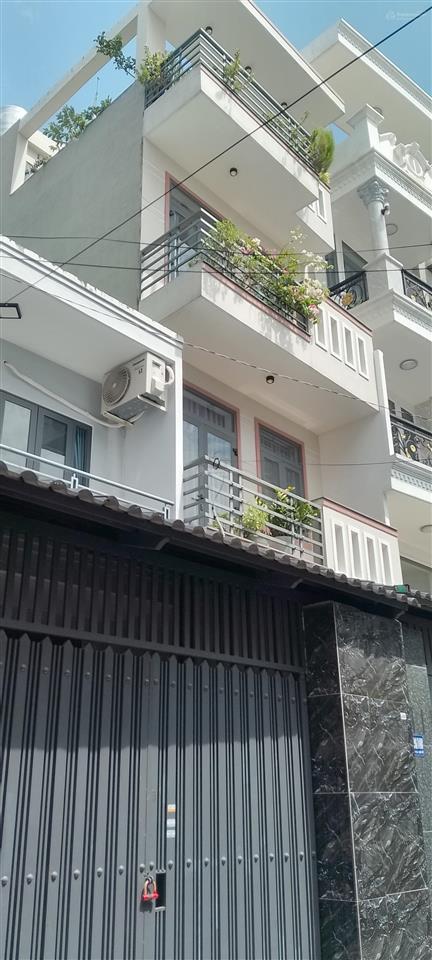 Ngay bàu cát + trương công định 4 tầng xây kiên cố 4x14, hẻm oto thông giá 8 tỷ x