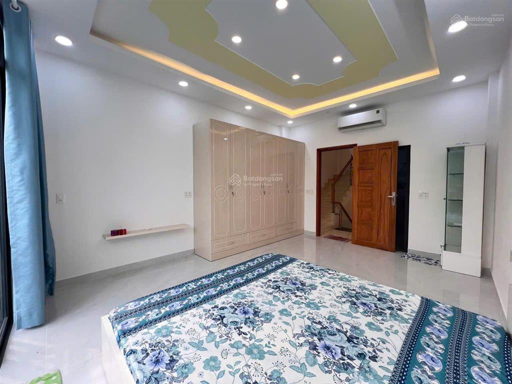 Nhà mới 4 tầng âu cơ (4x10)m đường nhựa. thiết kế trống suốt