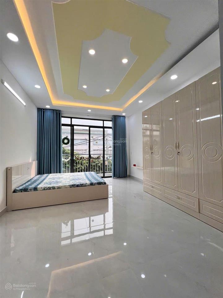 Nhà mới 4 tầng âu cơ (4x10)m đường nhựa. thiết kế trống suốt