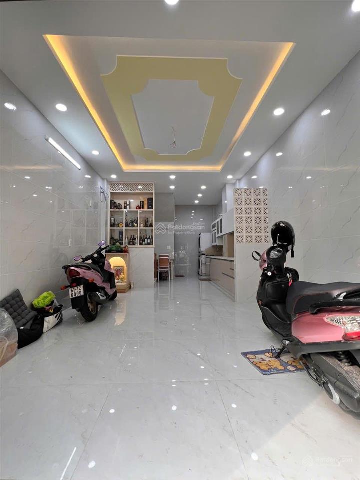 Nhà mới 4 tầng âu cơ (4x10)m đường nhựa. thiết kế trống suốt