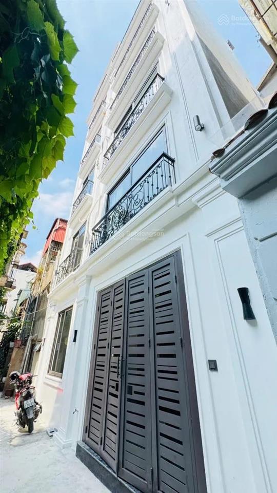 Nhà phố thái hà đống đa xây mới kính koongthang máy nhập khẩuô tô đỗ cổngngõ thông gần phố
