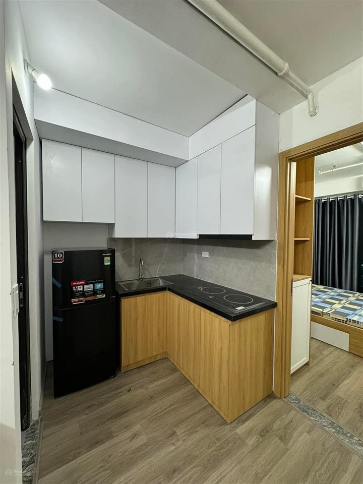 Tòa nhà in tiền nguyễn khang, 9 tầng thang máy, cách phố 15m. dt 100m giá 38 tỷ thương lượng.