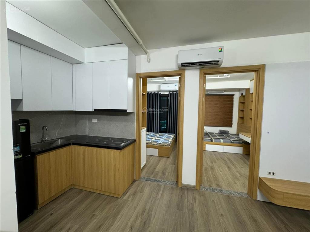 Tòa nhà in tiền nguyễn khang, 9 tầng thang máy, cách phố 15m. dt 100m giá 38 tỷ thương lượng.