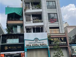 Bán gấp tòa nhà mt phan đình phùng pn  kết cấu  hầm 6 tầng . hdt  100tr/th .