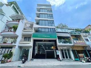 Tòa nhà góc 2 mặt tiền đường  ngay ngã tư lê quang định  phan văn trị . hầm 8 tầng thang máy.