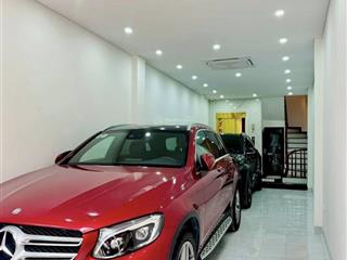 Mặt phố giáp bát 51m² x 6 tầng thang máy gara 2 ô tô ba thoáng.