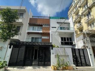 Nhà ngay chợ 100m2  giá 15 tỷ  ngang 5m  4pn  cao thị chính, q7