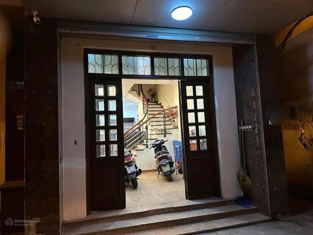 Bán nhà đống đa 52m2, kinh doanh ,ô tô vào nhà, 40m thẳng tắp ra phố, lô góc, nở hậu, nhà dân xây