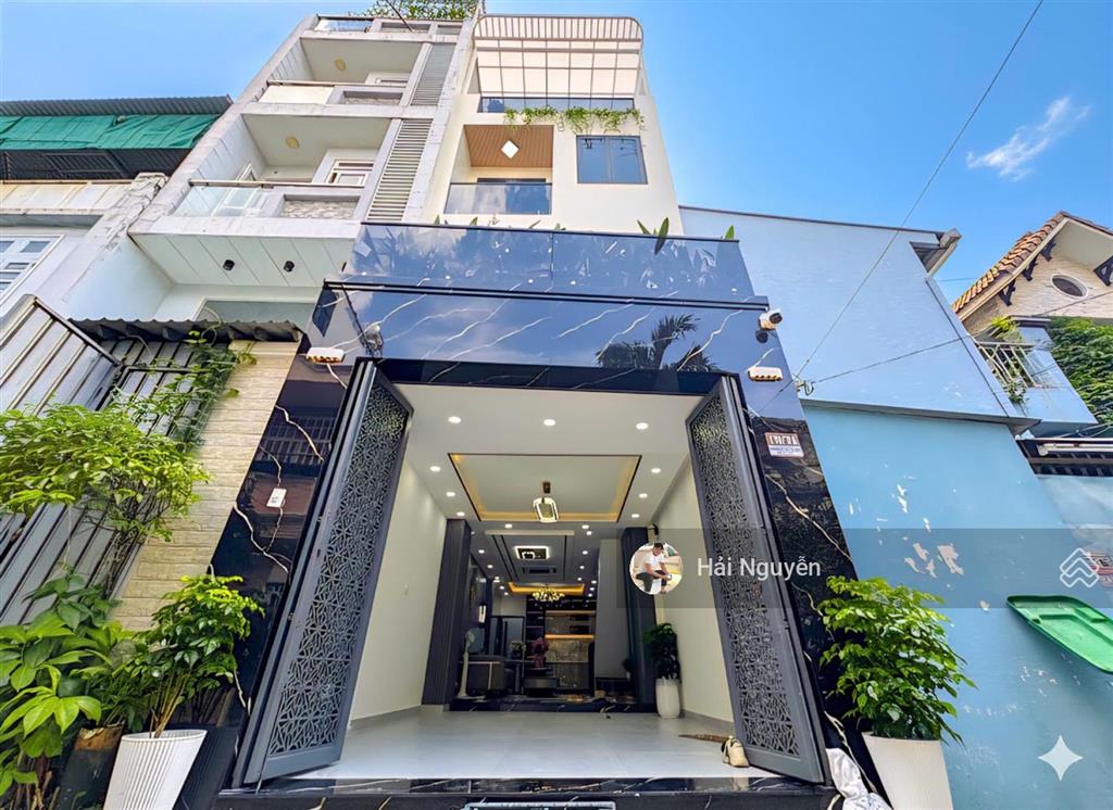 Nhà 3 lầu full nội thất hẻm xe hơi đường nguyễn thị thập  q7