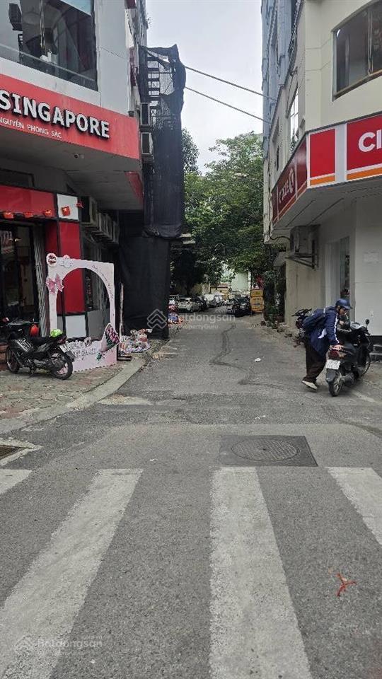 Bán nhà mặt phố nguyễn phong sắc, 2 mặt tiền kinh doanh, ô chờ thang máy.