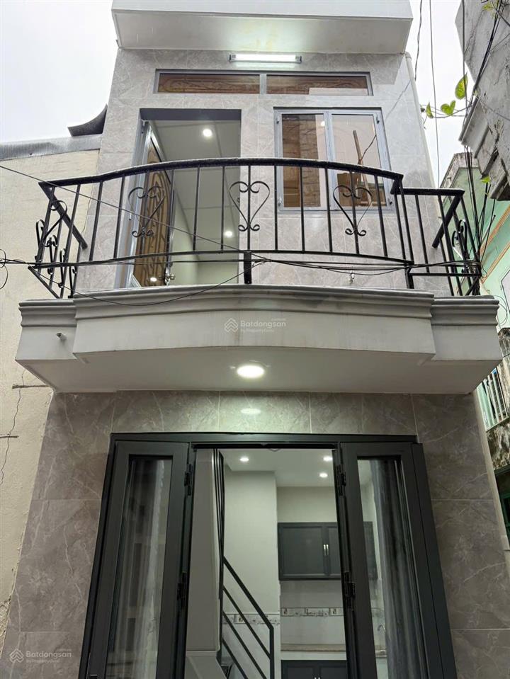 Bán nhà sổ hồng riêng sát hẻm xe hơi quận 7
