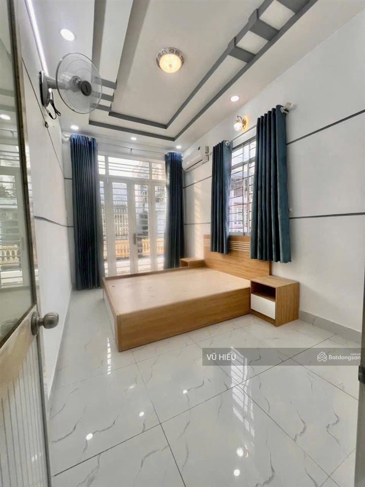 Bán nhà mặt tiền hẻm xe hơi  4 tầng  tt.nhà bè.