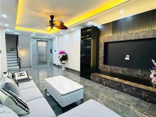 Quá hot! phố thái thịnh, thang máy xịn, sát mặt phố,ô tô đỗ cách 20m, sân xe riêng, nở hậu, 38m2*6t