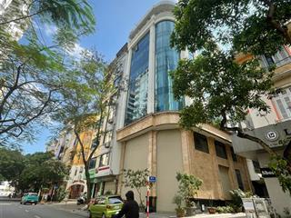 Tòa building lô góc trung kính đôi, full kính 100m2 7 tầng có hầm thông sàn thang máy 66tr/th