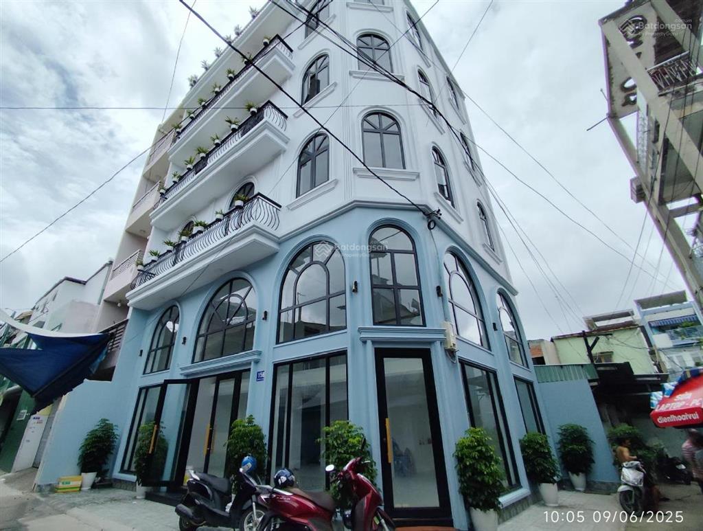 Toà nhà văn phòng góc 2 mặt tiền 120m2 5 tầng có thang máy ngang 12m ngay nguyễn ảnh thủ